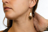 Solid 14k yellow gold dangle style earrings inspired by Pangolin scales. Hand hammered and fabricated earrings with scales that individually articulate and swing around playfully. Handmade in Maine USA.